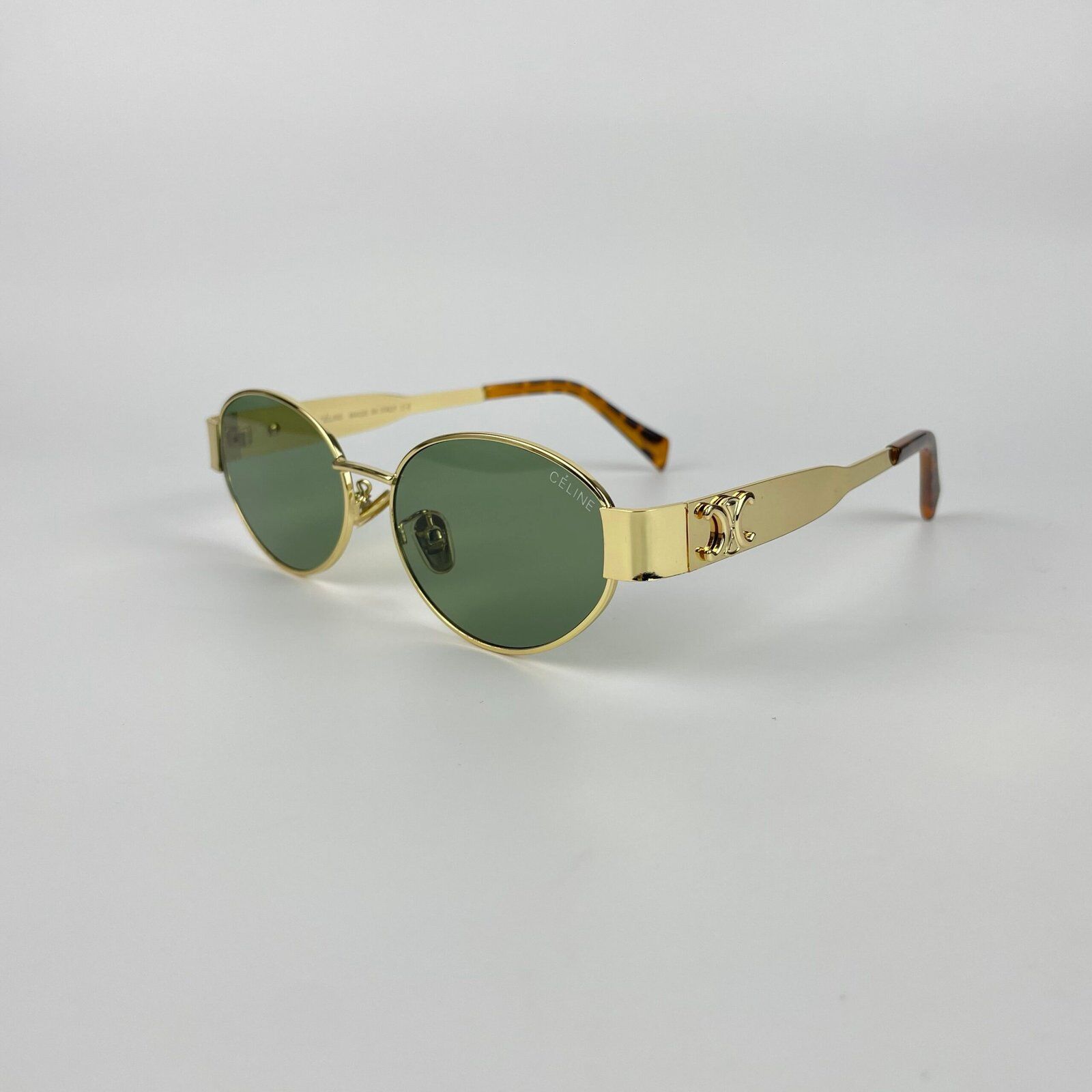 Lunette de soleil Céline doré vert kz1006