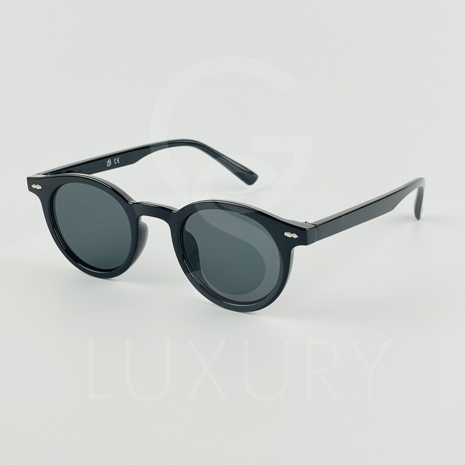 Lunette de soleil David Beckham Rond noir E140