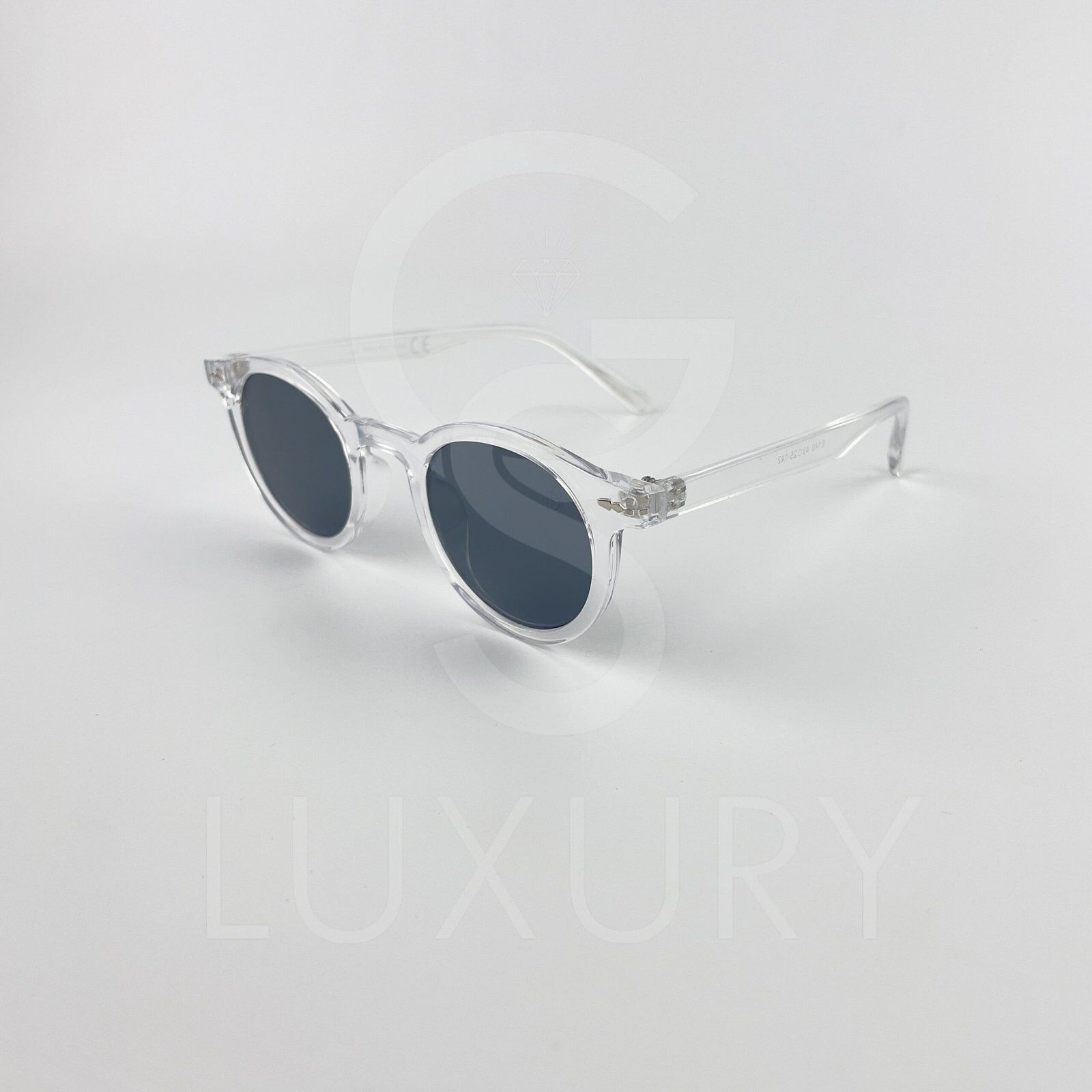 Lunette de soleil David Beckham Rond Transparent verre noir E140